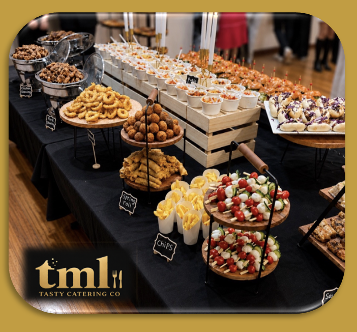 Grazing table with cheeses, cured meats and fruit